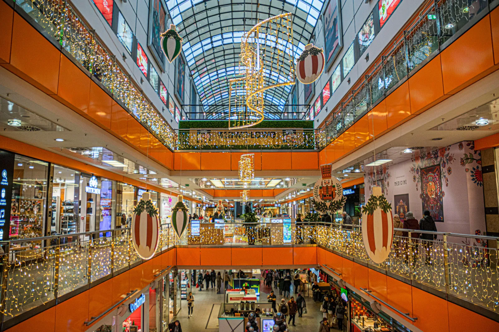 Photo Booth Software for Malls and Shopping Centers 1 Multi-level shopping mall interior decorated with holiday lights and oversized ornaments